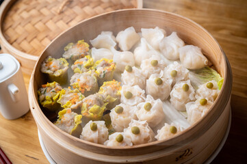 chinese steamed shumai in bamboo steamer