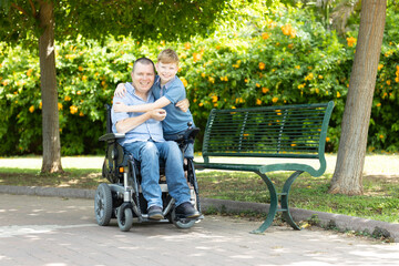 Disabled father with little son.