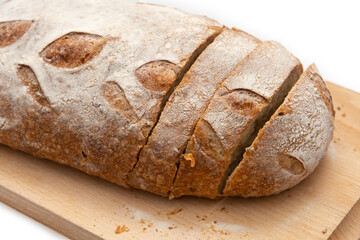 Sliced rye bread on a white background