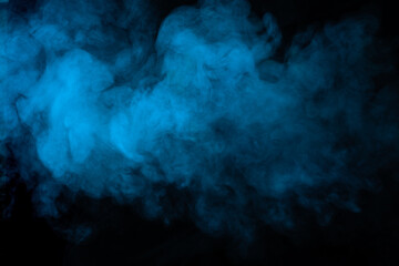 Fototapeta na wymiar Blue smoke texture on black background