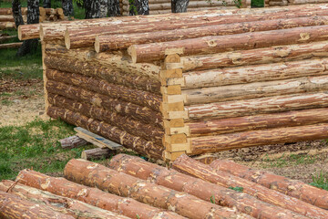 Wooden blockhouse made of logs in a clearing