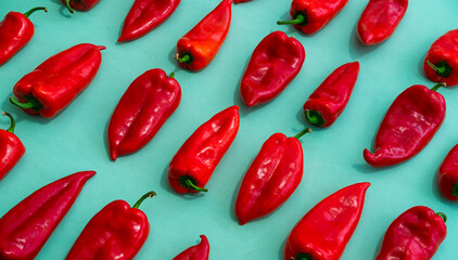 Red peppers on blue background