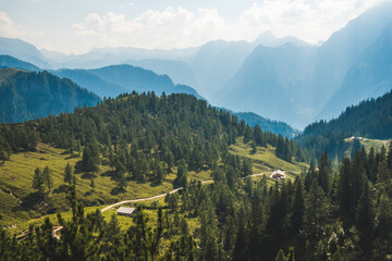 Beautiful mountain view in the bavarian Alps, scenic rural background with green forests and mountains