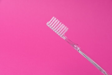 Toothpaste on a pink background