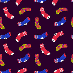 Seamless colored socks background. Cartoon cute socks in the form of a pattern for winter. Accessories for the New year: red and multi-color socks in the flat style. Hand-drawn Christmas accessories