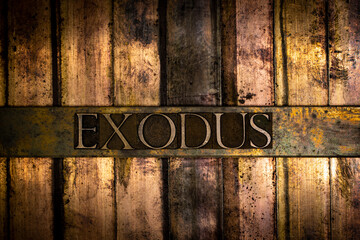 Exodus text message on vintage textured grunge bronze background