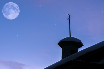 Fototapeta na wymiar Muslim mosque on the background of the moon