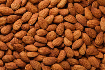 Texture background of almonds. Healthy eating. Top view. Food background.