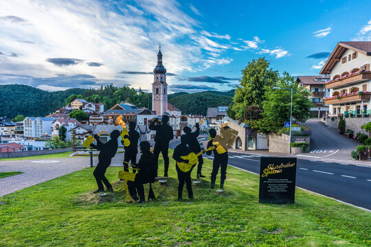 Kastelruth, Italy - 28 June 2018: Jazz band Kastelruther Spatzen cut outs in the green lawn in town of Kastelruth, Castelrotto in Italy