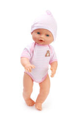 Toy baby doll in pink clothes and hat on white.