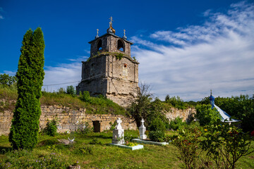 Fototapeta na wymiar An old church with ruins in the city of Satanov.