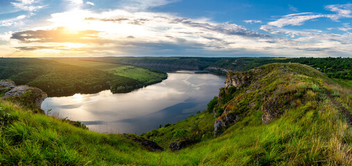 Beautiful evening over the canyon with the river. Europe trip in summer.