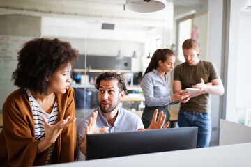 Collaboration and analysis by business people working in office