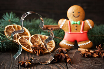 Gingerbread little man  with cookie cutter, Christmas concept