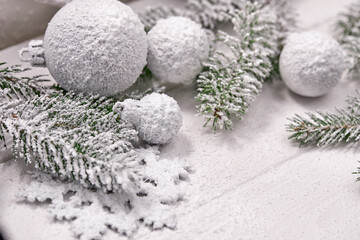 Fototapeta na wymiar Christmas decoration with white balls and stars