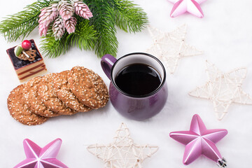 Christmas holiday Breakfast. A Cup of coffee and ginger cookies with sweets