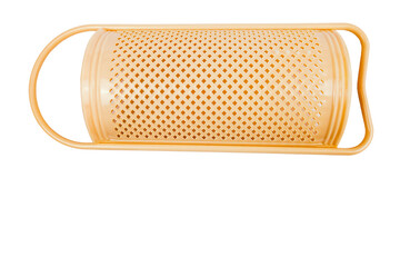 yellow plastic grater on a white background
