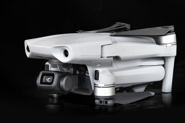 Gray drone on a black background