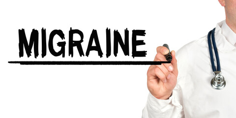 Doctor writes the word - MIGRAINE. Image of a hand holding a marker isolated on a white background.