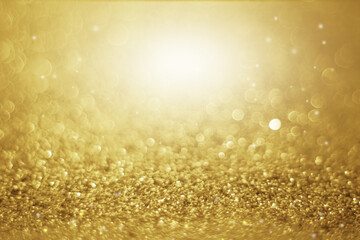 gold glitter abstract background with soft glowing texture for Christmas.