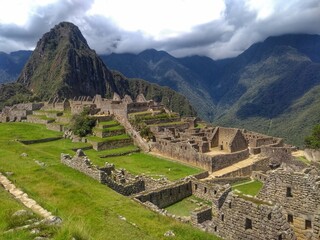 Fototapeta na wymiar Ruins - Machu Picchu - The lost city of the Inca in Peru, South America. Set high in the Andes Mountains, is a UNESCO World Heritage Site and one of the New Seven Wonders of the World.