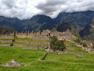 Fototapeta na wymiar Ruins - Machu Picchu - The lost city of the Inca in Peru, South America. Set high in the Andes Mountains, is a UNESCO World Heritage Site and one of the New Seven Wonders of the World.