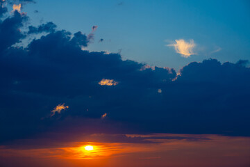 Heavy cloudy sky at sunset. A landscape of beautiful nature
