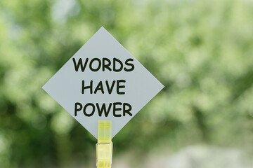 Words have power text on paper notes on blur nature background
