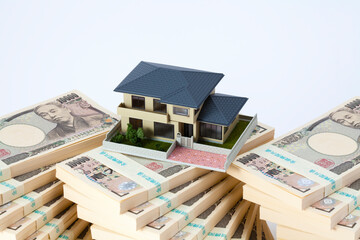住宅と札束