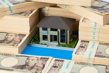 住宅と札束