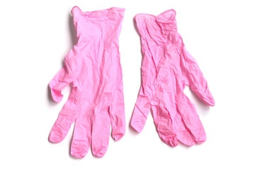 New pink medicine gloves isolated on white background.