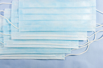 Background concept for news about the novel coronavirus COVID-19 pandemic, antiviral medical mask...