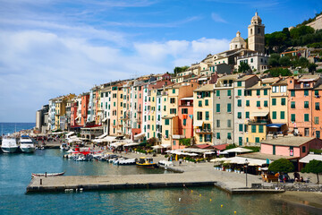 Colorful picturesque harbour of Porto Venere with San Lorenzo church, Doria Castle and Gothic...