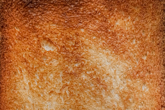 Pattern of slice toasted sandwich bread. Food allergy. View from above, close up. the structure of bread toast