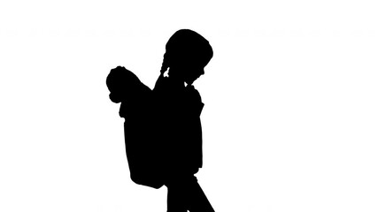 Silhouette Cute little girl walking to school with a teddy bear sticking out of her backpack. - Powered by Adobe
