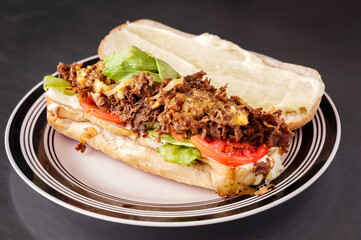 Homemade open face steak and cheese sub sandwich 