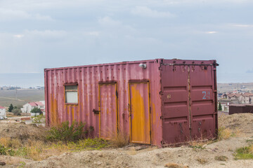 Fototapeta na wymiar marine metal container adapted for housing