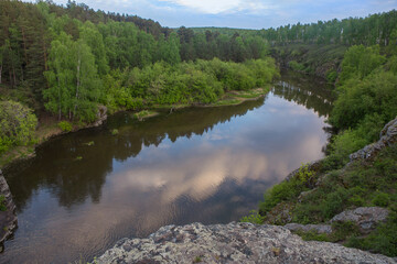 Fototapeta na wymiar Beautiful winding river in the forest