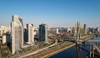 Fototapeta na wymiar Cable-stayed bridge or Estaiada bridge (Ponte Estaiada), over the Pinheiros river and Marginal Pinheiros, at Sao Paulo city. Brazil.