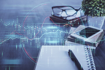 Double exposure of forex chart drawing and cell phone background. Concept of financial trading