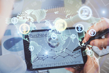 Double exposure of man's hands holding and using a phone and financial chart drawing. Market analysis concept.