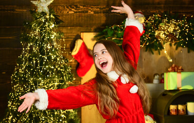 Colorful fun. happy childhood. this winter night be bright. santa helper elf at christmas tree....