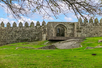 Fototapeta na wymiar Internal garden and castle wall in the medieval city of Trancoso, Guarda district, Beira Alta province, Beira Interior Norte sub-region, Portugal