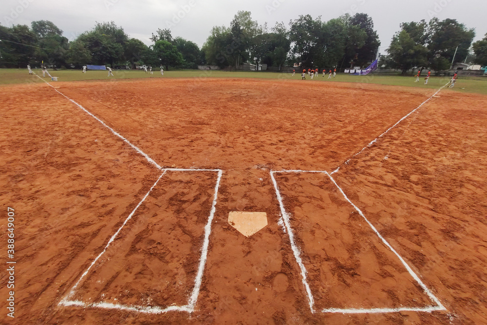 Wall mural view of a softball field from home plate