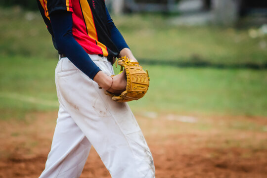 Pitcher Softball Player Holding Softball In Hand Ready to Throw the Ball Color