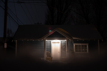 snowy house at night © Mountain Goat Photo
