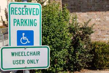 Fototapeta na wymiar handicap parking reserved sign