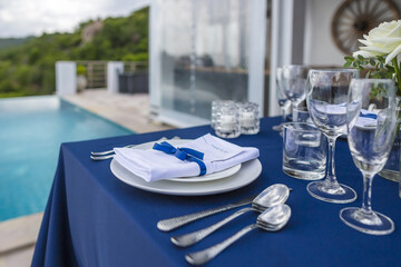 Blue and Silver Romantic Wedding Table Top Layout Table Spread no people no human tropical location with the sea with copy space