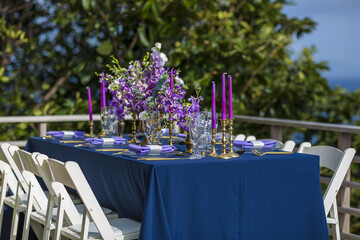 Purple and Gold Romantic Wedding Table Top Layout Table Spread no people no human tropical location copy space sea view trees and jungle ocean