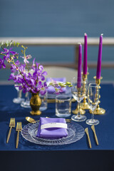 Purple and Gold Romantic Wedding Table Top Layout Table Spread no people no human tropical location copy space sea view trees and jungle ocean